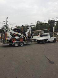 MINICARGADOR CON EXCAVADORA
