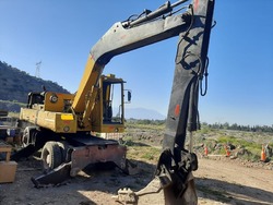 EXCAVADORA NEUMATICA POCLAIN 90 AÑO 1971 6235 HORAS